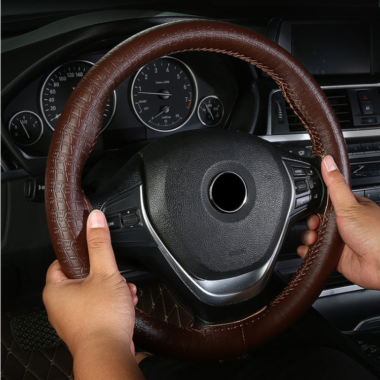 Four-season Embossed Cowhide Hand-sewn Steering Wheel Cover